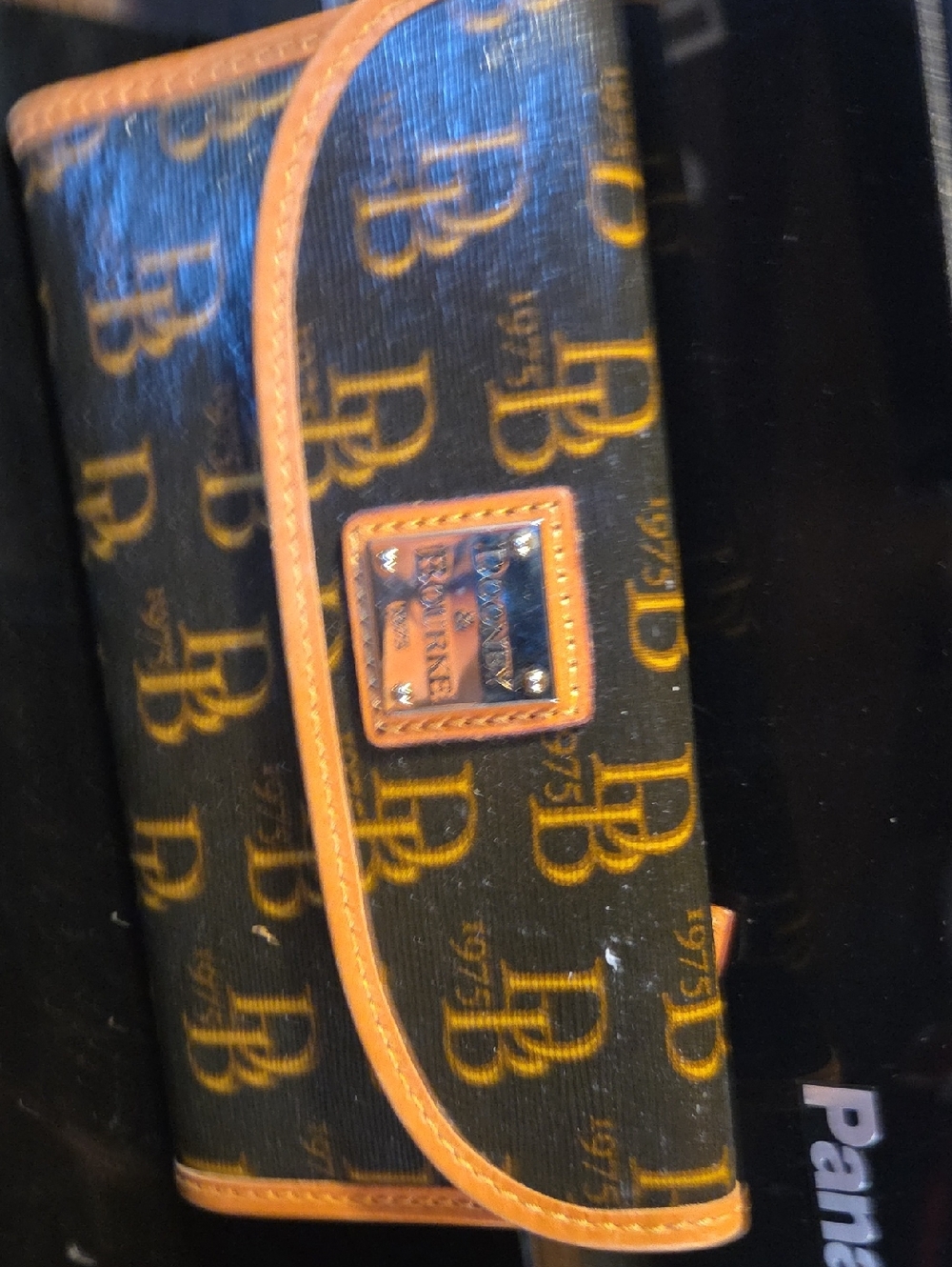 Dooney & Bourke Black and Tan Signature Fold Wallet